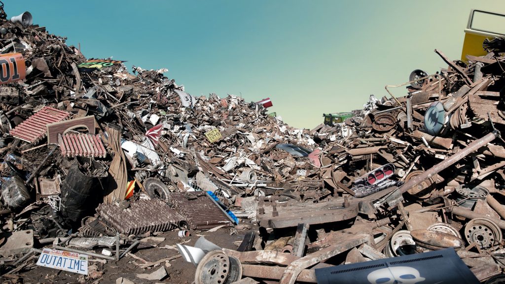 Can You Identify The Iconic Movie Car Parts Buried In This Junkyard? image