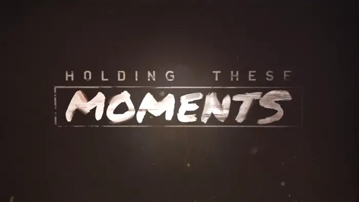 Holding These Moments Image