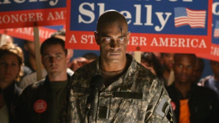 Zombie soldier in military uniform speaks at a political rally in Joe Dante’s Masters of Horror: Homecoming (2005).