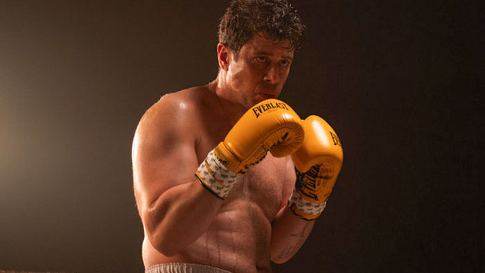 Toby Kebbell as Sal in boxing stance with yellow gloves in Salvable