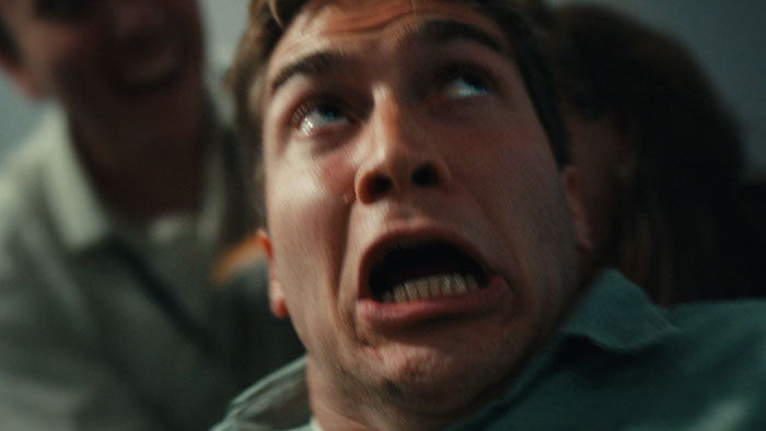 Terrified man recoiling in a scene from the short film How Was Your Weekend, screening at Palm Springs ShortFest 2025