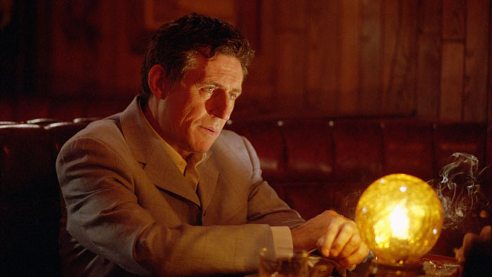 Gabriel Byrne in a moody scene from Shade (2003), an RKO Pictures crime drama