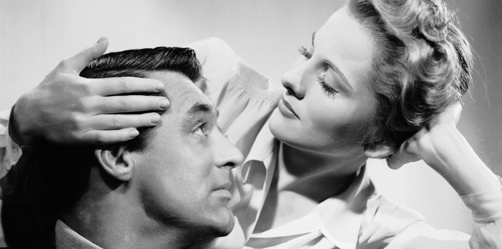 Cary Grant and Joan Fontaine in a romantic close-up from Alfred Hitchcock’s Suspicion (1941)
