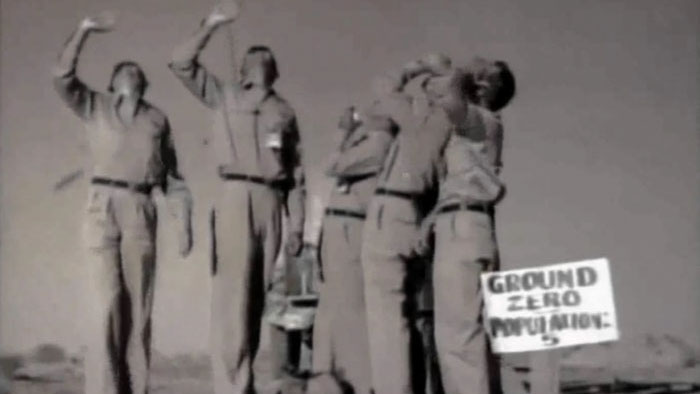 Soldiers standing at Ground Zero during Nevada nuclear test as seen in 928 The Threat Continues