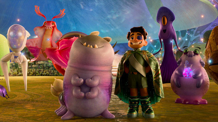 Elio stands confidently among a colorful lineup of alien beings in Pixar’s Elio.