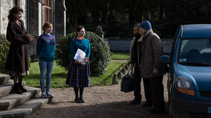 Cast members greet John Malkovich’s character Andrew Blake at the Beauvillier Estate in Mr. Blake At Your Service!