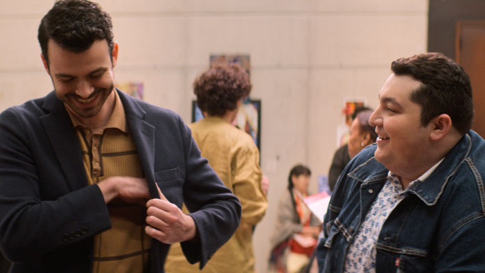 Joey Pollari and Max Talisman share a laugh at a gallery event in Things Like This