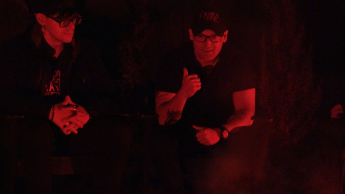 Paranormal investigators Matt Benton and teammate conduct a nighttime investigation in Evil Unearthed.