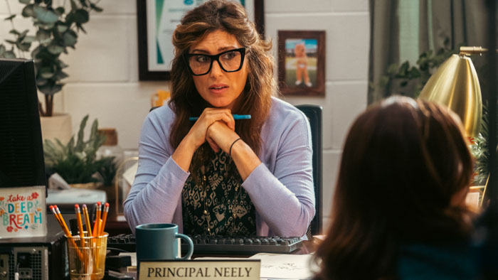 Principal Neely (Jennifer Esposito) meets with a student in F Plus.