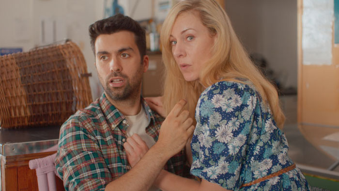 Two characters share a tense moment in Portraits of Dangerous Women