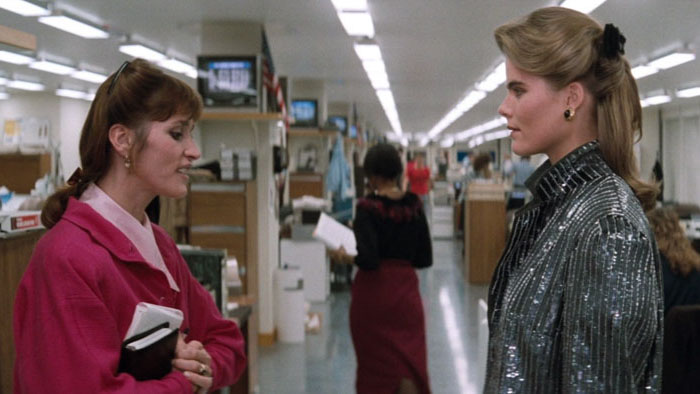 Lois Lane and Lacy Warfield face off in the Daily Planet newsroom.