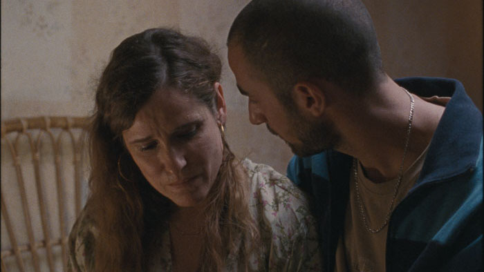 Chatila and Tatiana share a tense conversation in To a Land Unknown