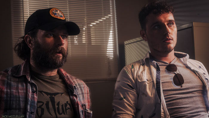 Anthony and Brooke sitting together in Against the Spread.