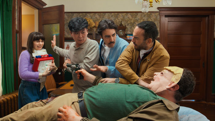 Scene from Doctor Doctor where Oliver and others struggle with an armed patient.