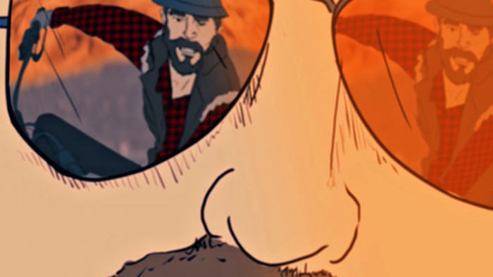 Close-up of sunglasses reflecting a man in The Nomad