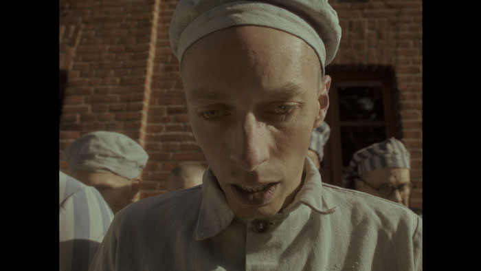 Emaciated prisoner in Auschwitz from Triumph of the Heart