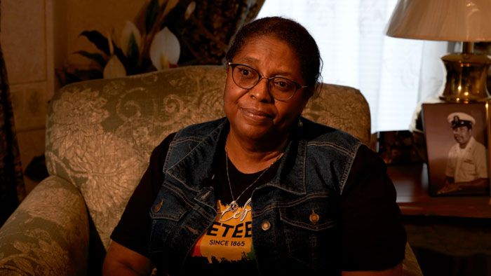 Scherita Hill seated for an interview in Quiet Voices In A Noisy World: The Struggle for Change in Jasper, Texas.