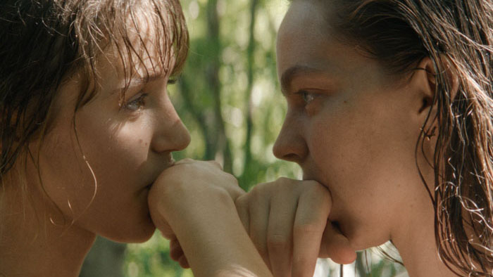 Jara Sofija Ostan as Lucia and Mina Svajger as Ana-Maria in Little Trouble Girls (2025)