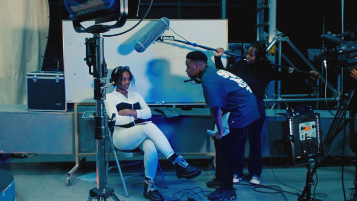 Film crew recording a scene on set in Behind the Behind the Scenes (2026) directed by James Ongige