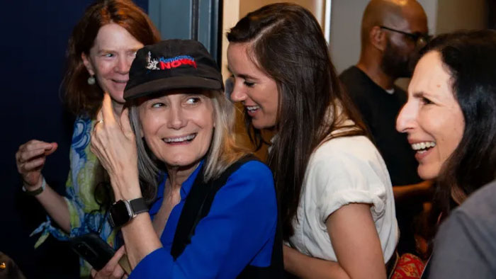 Amy Goodman smiling at the Steal This Story, Please premiere