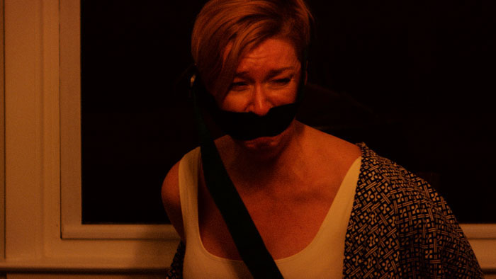 Jane Gajewski (Maya Murphy) tries to scream in Mamochka.