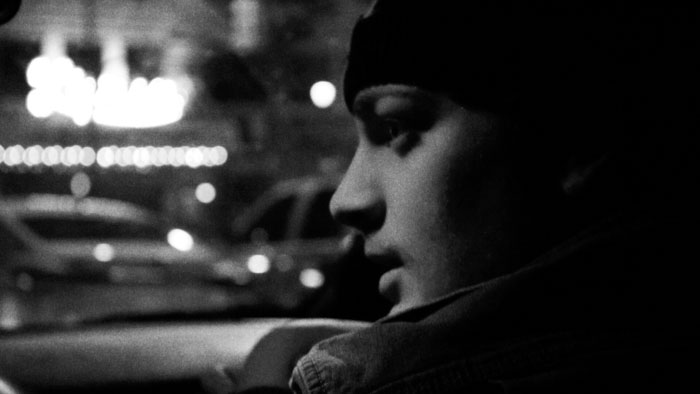 Harry Carruthers (Richard Kaiser) rides through the city at night in Moon Beams.