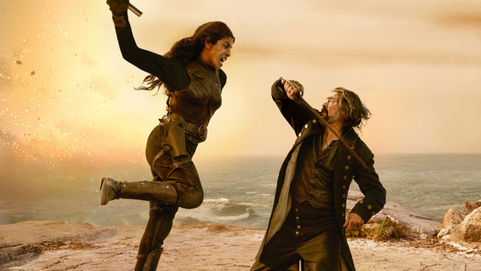 Close-up of Priyanka Chopra Jonas as Ercell holding a spyglass in The Bluff (2026).