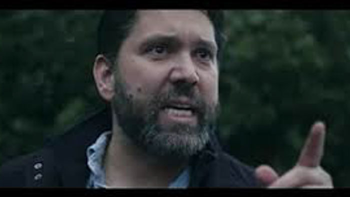 Jed Fisk confronts someone outside in The House on Lidderman Street (2026)