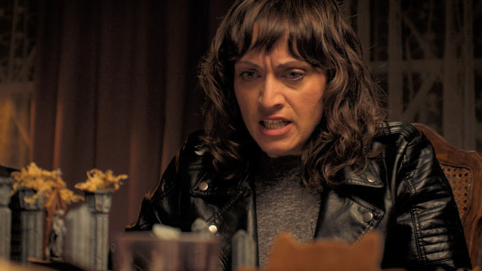 Fayna Sanchez as Laura in Total Party Kill reacts during a tense tabletop RPG session at Cinequest 2026.