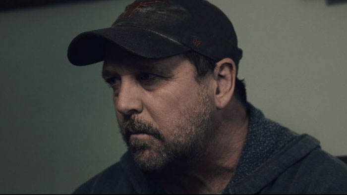 Shane Snyder (Kevin Machate) in a close-up moment of isolation in Worst Enemy (2026).