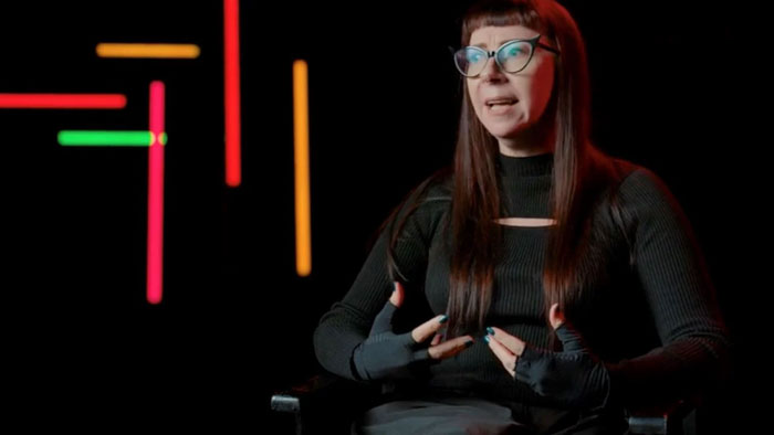 Alexandra Heller-Nicholas speaks on camera in 1000 Women in Horror.