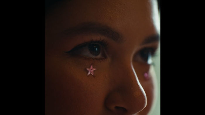 Charlie (Gabriela Ochoa Perez) wears star makeup beneath her eye in Charliebird.