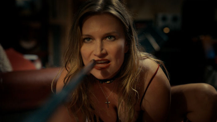 Lucy Morningstar (Kym Jackson) confronts Kurt Cobryn in Melodies of the Abyss (2026)