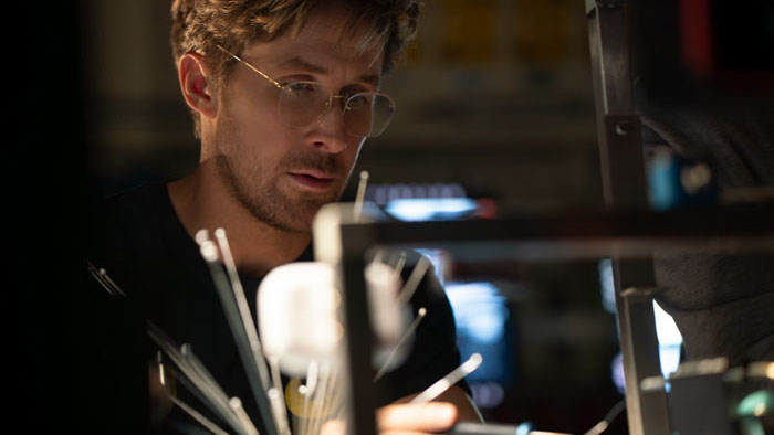 Ryland Grace (Ryan Gosling) conducting experiments in a lab in Project Hail Mary.
