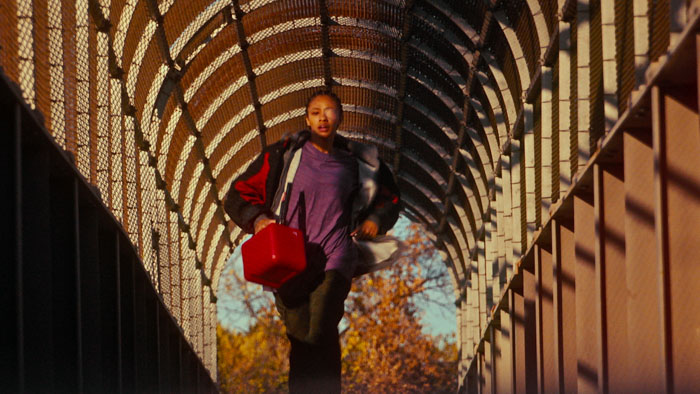 Billie (Troy Leigh-Anne Johnson) runs across a pedestrian overpass in Silver Star.