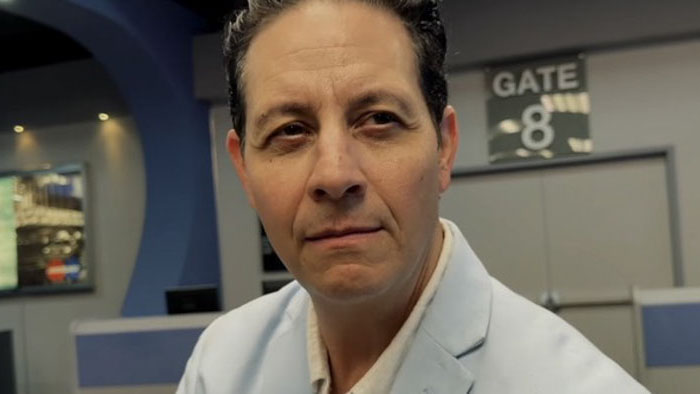 Martin (Chris Spinelli) at the terminal in Sudden Light.