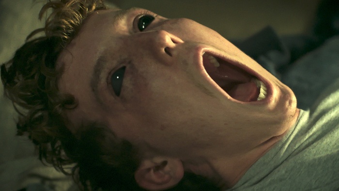 Michael (Jack Gouldbourne) in a possessed state in The Containment.