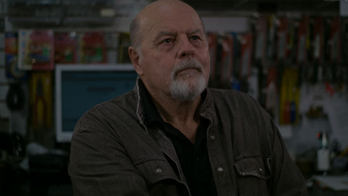 Uncle Bill (Michael Ironside) inside the gas station in Ashes.