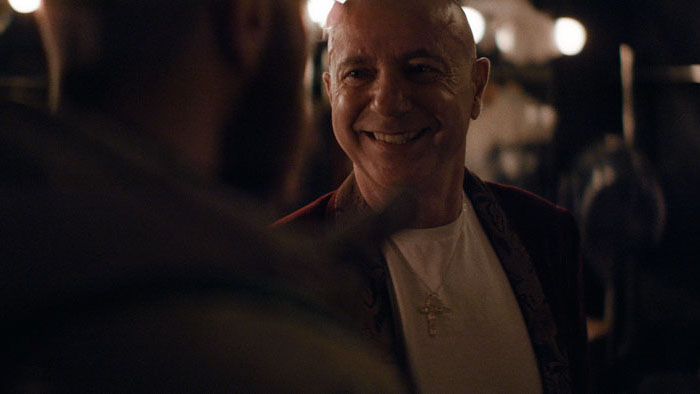 Paco (Miguel Angel Plaza) smiling backstage in Eyelashes.