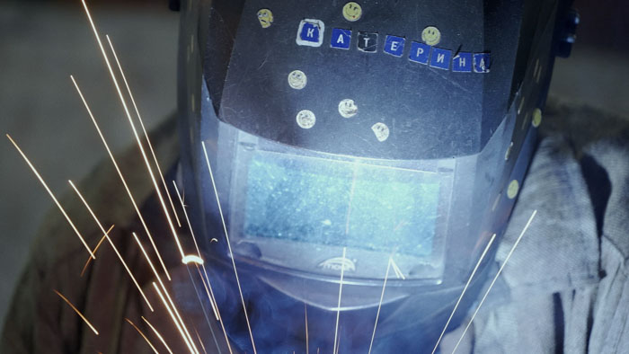 A welder works beneath sparks in Welded Together, featured at Mammoth Lakes Film Festival.