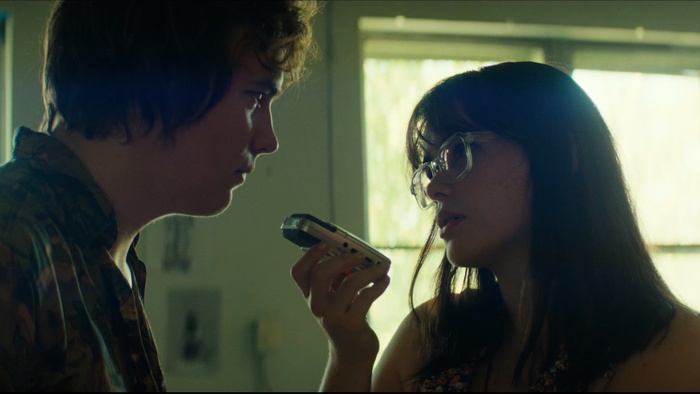 Grace (Barbie Ferreira) speaks into a recorder in Mile End Kicks.