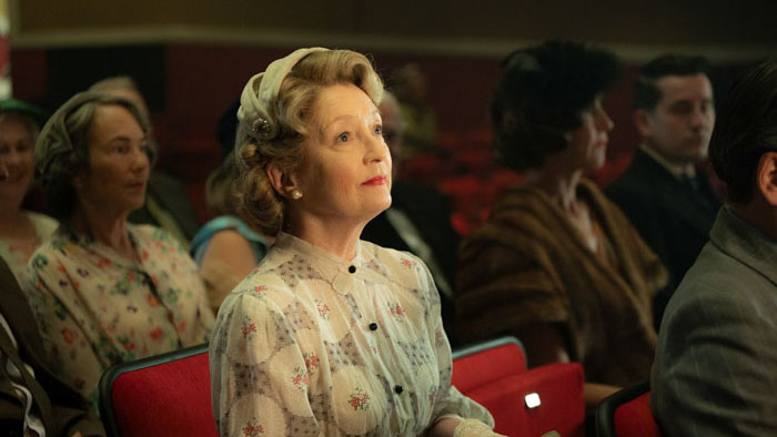 Ma Smith (Lesley Manville) watches a stage performance in Mr. Burton.