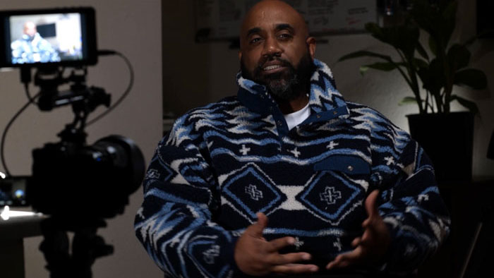 Clive Christopher in an interview setup in Skywatched.