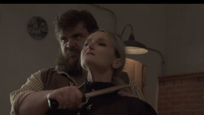 Ray (Jake C. Young) holds a knife to Sister Agatha (Audri Curtsinger) in Souls Chapel.