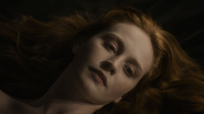 Jane Hillman (Lindsay Ayliffe) lying motionless in TALISKER: Vol. 1.