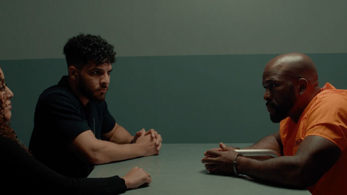Corey Shaw (Omar Cook) during an interrogation scene in LA Undercover: Against The Code.
