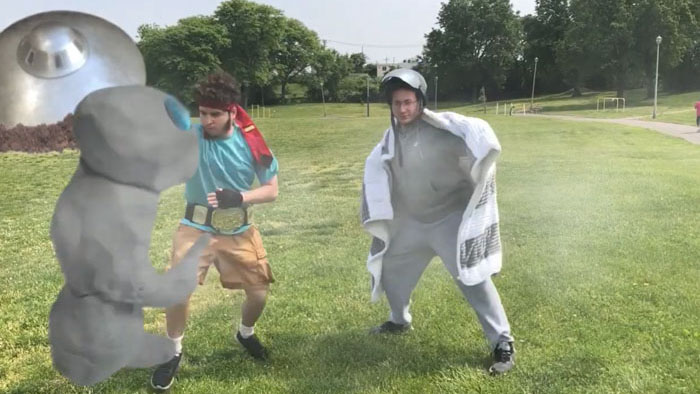 Dash and Crash Raygun battle a CGI alien in a park in The Adventures of Dash and Crash Raygun.