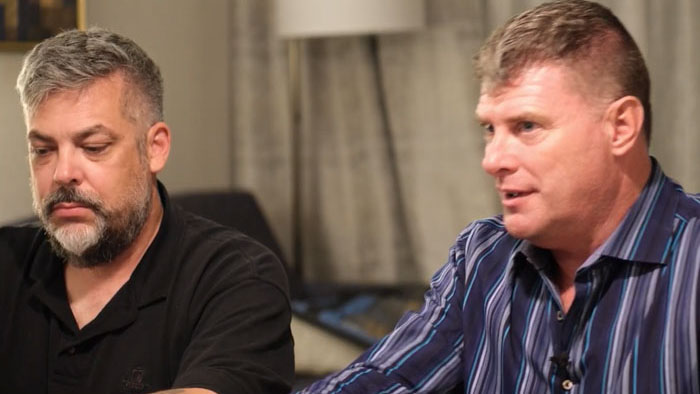 Tony Rodrigues and Chris O'Connor seated together during an interview in Dark Alliance: The Next Generation.