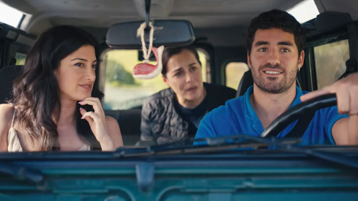 June (Ayden Mayeri), Lela (Amira Casar), and João (José Condessa) driving through the Azores in Honeyjoon.