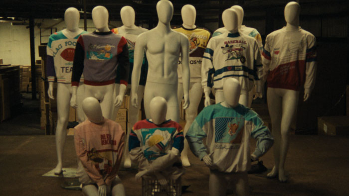 Mannequins dressed in colorful vintage Adidas jerseys fill a warehouse in Mr Adidos.